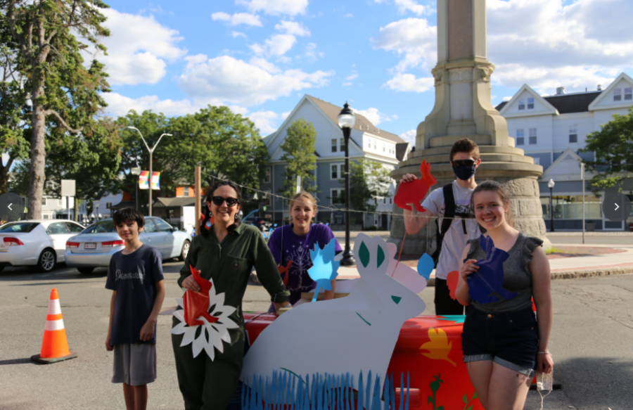 Art club members stand in front of  their art installation// photo credit Indigo B.